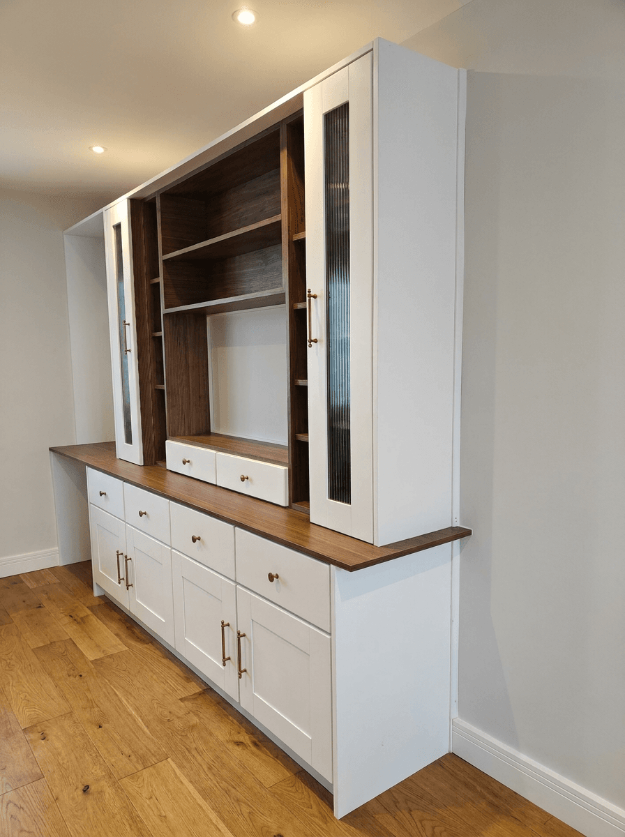 A fitted media wall built in the Youniche Woodworking workshop