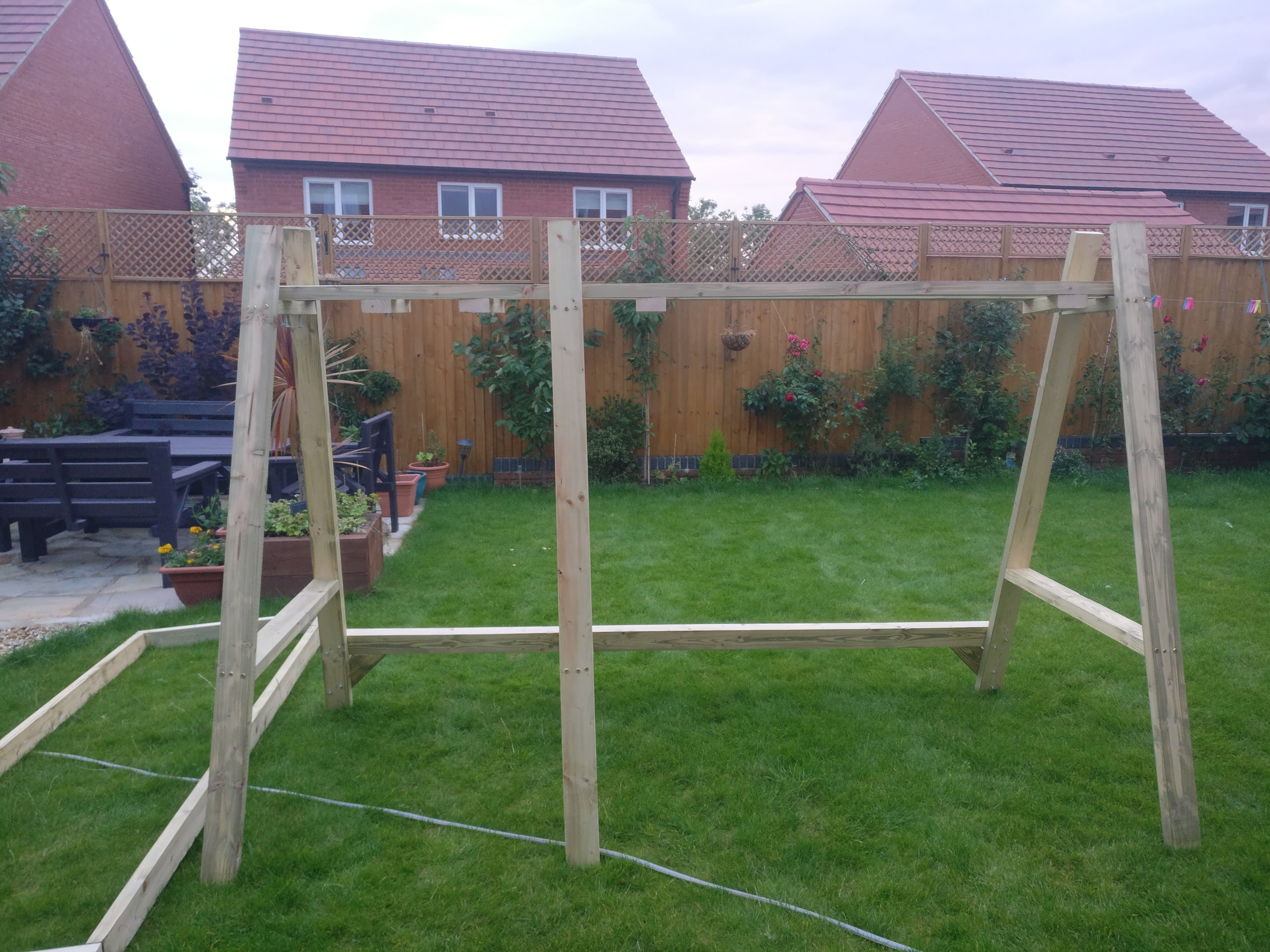 Bare timber A-frame for the garden swing set, before the swings were hung